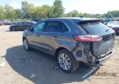 2023 Ford Edge Titanium z USA, uszkodzony, nr VIN 2FMPK4K96PBA26800